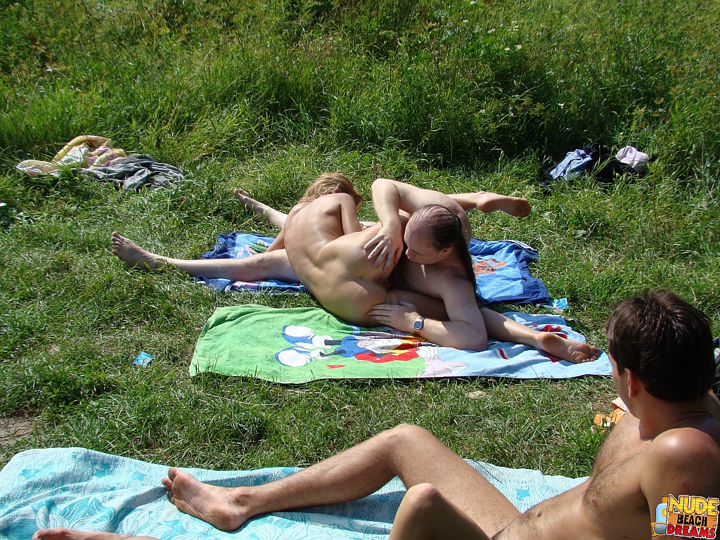 Two Couples Flirt While Nude Beach Swingers